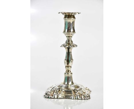 A late Victorian hallmarked silver taper stick, London 1891, loaded base, height 12cm.