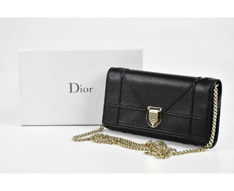 CHRISTIAN DIOR; an unused black pebbled leather Diorama handbag with maker's gold tone Cannage crest shape buckle to front, w