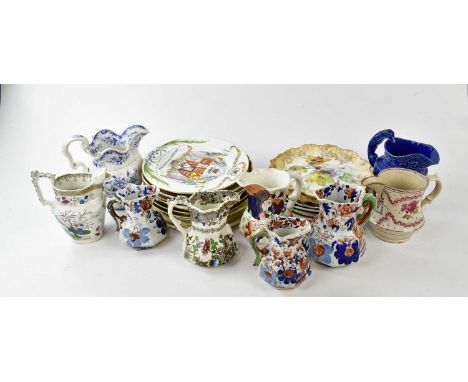 A collection of Victorian and later ceramics including various plates, Spode, Ironstone, and a collection of similar jugs.