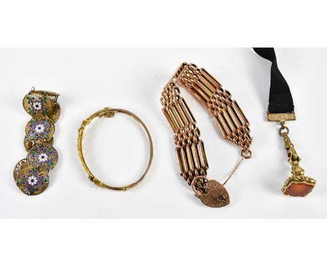 A 9ct rose gold five bar gate link bracelet, a yellow metal oval hinged bangle, combined approx. 36.4g, an enamel decorated p