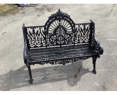 A Victorian style black painted cast iron heavy gauge garden bench, length 120cm.