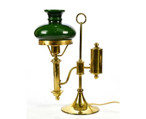 A 20th century brass reading lamp with green glass shade, height 45cm.