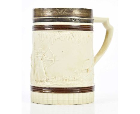 THOMAS TURNER, STAFFORDSHIRE; a Georgian ceramic mug, relief decorated with archery scenes, with hallmarked silver mount, Lon