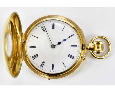 An 18ct yellow gold crown wind half hunter lady's fob watch, the enamel dial set with Roman numerals, diameter 35mm, total we