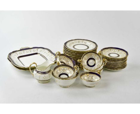 CAULDON; a part tea service comprising ten cups, twelve saucers, twelve side plates, two serving plates, cream jug and a suga