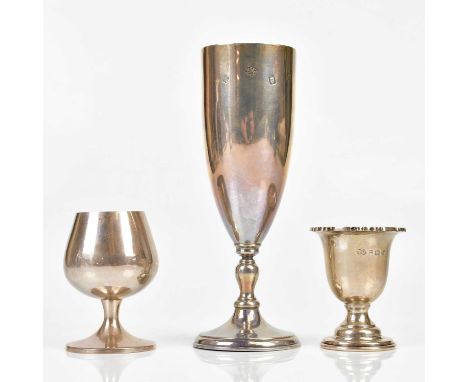 ASPREY &amp; CO; an Elizabeth II hallmarked silver goblet with gilt interior, London 1974, a sterling silver shot glass and a