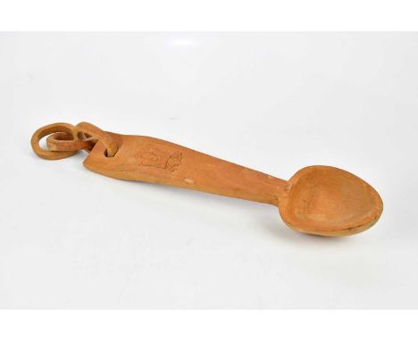 LEWIS OWEN; a hand carved commemorative Welsh spoon for the Investiture of The Prince of Wales in 1969, signed verso, length 