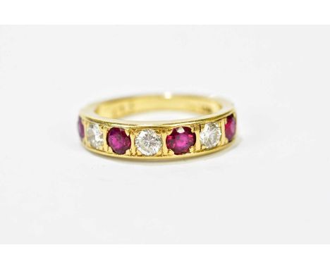 An 18ct yellow gold five stone ruby and diamond ring, each stone approx. 0.15cts, size M, approx. 4.5g.