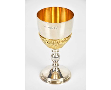 ASPREY; an Elizabeth II hallmarked silver goblet with applied gilt detail, produced to commemorate the Queen's Silver Jubilee