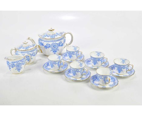 ROYAL CROWN DERBY; a six setting tea service comprising six cups, six saucers, teapot, sugar bowl and cream jug.