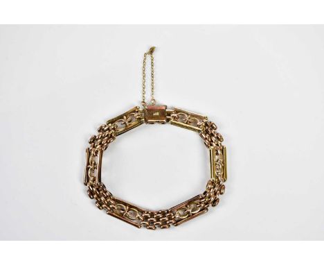 A 9ct rose gold open gate link bracelet with safety chain, approx 14.2g.