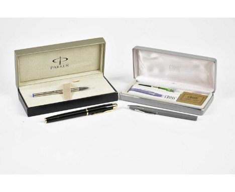 PARKER; an unused, boxed black enamel and gold tone ink pen, and a Cross grey Concorde ink pen with ink cartridges, boxed (2)