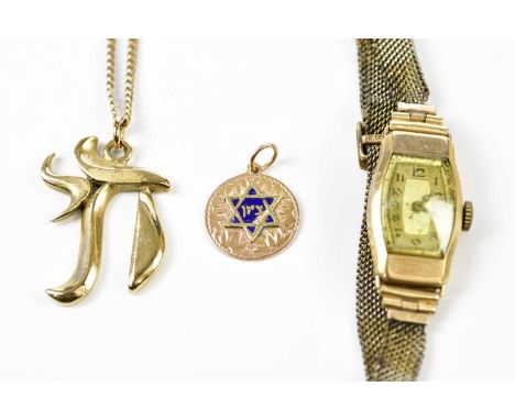 A 9ct yellow gold chain suspending a 9ct gold pendant (approx. 10.2g), a yellow metal enamelled pendant (approx. 1.16g), and 