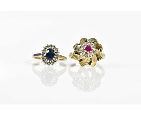 Two 9ct yellow gold dress rings, the sapphire and diamond example size K ½, the second size N, combined approx. 7.1g (2)
