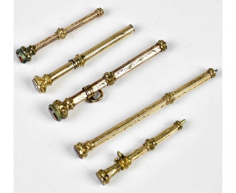 Five Victorian yellow metal propelling pencils, including an example with engine turned decoration, length of largest example