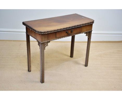 A carved mahogany Chippendale style tea table, with foldover top, on moulded legs, height 73cm, width 89cm.