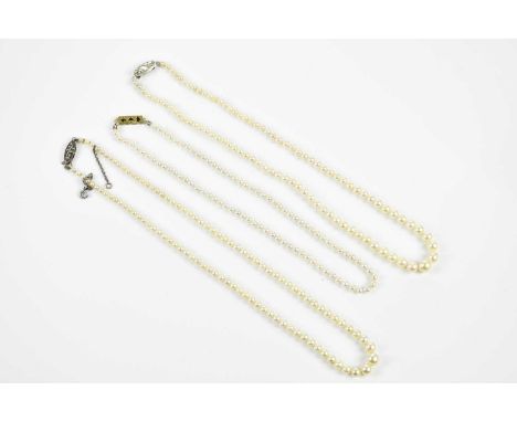 Three strands of vintage cultured pearls, one with 14ct yellow gold clasp (3)