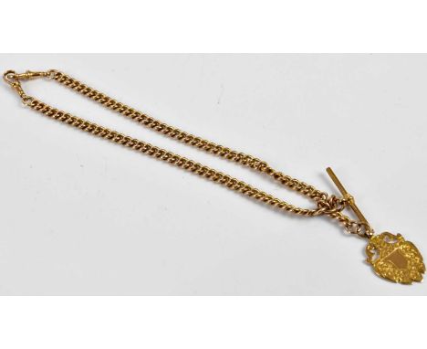 A 9ct gold double Albert chain, suspending a shield shaped fob with vacant engraved panel and T-bar, combined approx. 60g.N.B