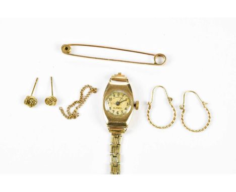 A vintage 9ct yellow gold wristwatch, a 9ct gold tie pin, a pair of knot studs, and a pair of earrings (4)