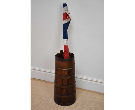 A coopered oak stick stand, height 65cm, and a modern Union Jack (2).