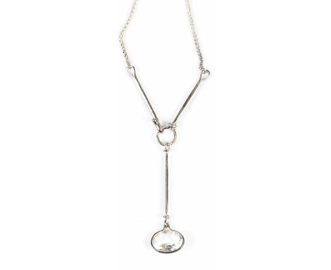 GEORG JENSEN; a silver lariat pendant with clear stone drop, with both inner and outer box, length of chain to ring of pendan