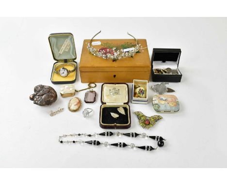 An assortment of costume jewellery including a hallmarked silver chatelaine holder, cameo style brooch, smoky pendants, jet a