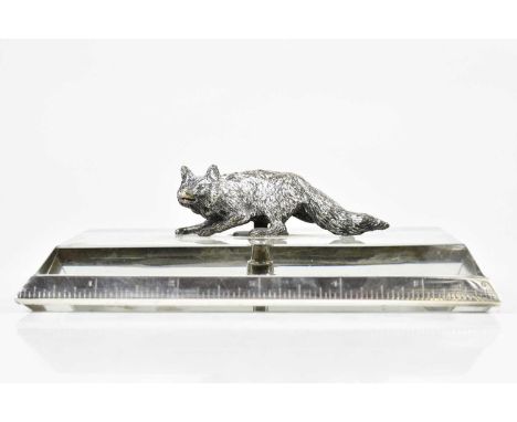 ASPREY; an Art Deco silver mounted glass desk paperweight, modelled with a fox, London, 1926, length 15cm.Condition Report: L