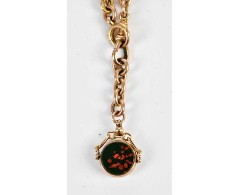 A 9ct yellow gold trombone link chain with bloodstone set swivel fob and T-bar, length 39cm, approx 45.7g.   Condition Report