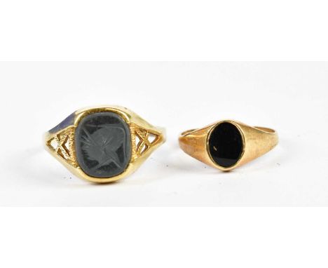 Two 9ct yellow gold signet rings, sizes W and K, combined approx 4.7g (2).