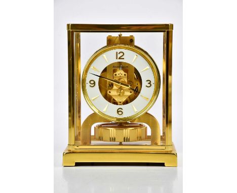 JAEGER-LECOULTRE; a Skeleton Anniversary Atmos Clock, the white chapter ring set with Arabic and baton numerals, with brass a