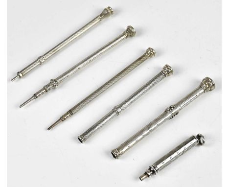SAMPSON MORDAN &amp; CO; a miniature propelling pencil with engine turned decoration, and five further hallmarked silver prop