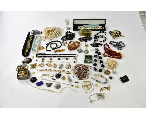 A collection of costume jewellery to include bead necklaces, hallmarked silver thimbles, a lighter, faux pearls, a brooch, ba