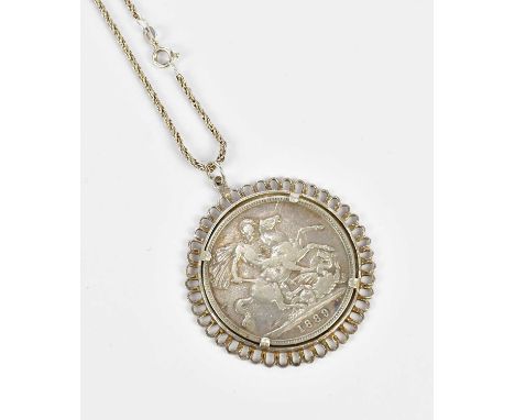 A Victorian silver crown, 1889, set in a pendant mount and supported on a chain.
