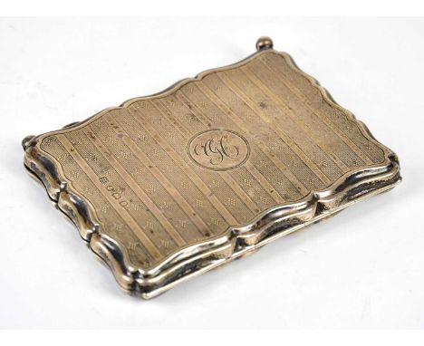 A &amp; J ZIMMERMAN; a George V hallmarked silver purse, with engine turned decoration, Birmingham 1913.
