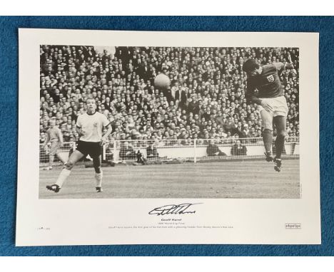 Geoff Hurst signed 22x16 1966 World Cup Final black and white print Geoff Hurst scores the first goal of his hat trick with a