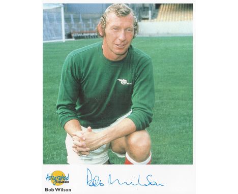 Football. Bob Wilson Signed 10x8 Autographed Editions page. Bio description on the rear. Photo shows Wilson having a close up