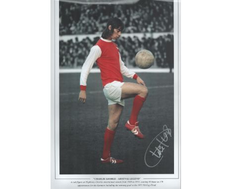 Football. Charlie George Signed 18x12 colour/black/white photo. Photo shows George doing keepy uppies in an Arsenal kit. Good