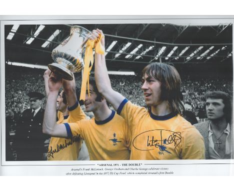 Football. Charlie George Signed 18x12 black and white photo. Photo shows George Holding the 1971 FA Cup after beating Liverpo