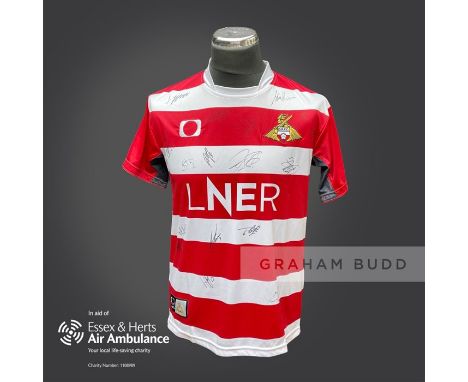 Doncaster Rovers 2020-21 season replica shirt personally signed in black marker to the front by 18 members of the playing squ