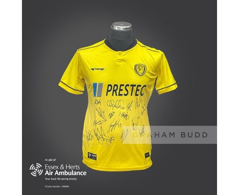 Burton Albion 2020-21 season replica shirt personally signed in black marker to the front by 16 members of the playing squad.