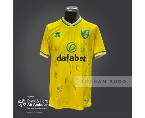 Norwich City 2020-21 season replica shirt personally signed in black marker to the front by 17 members of the playing squad. 