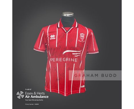 Lincoln City 2020-21 season replica shirt personally signed in black marker to the front by 23 members of the playing squad. 