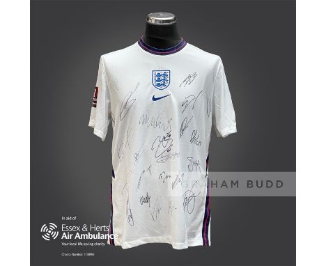 England 2020-21 season replica shirt personally signed in black marker to the front by 22 members of the playing squad. Comes
