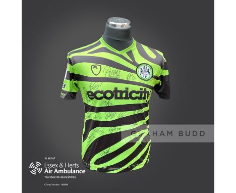 Forest Green Rovers 2020-21 season replica shirt personally signed in black marker to the front by 17 members of the playing 