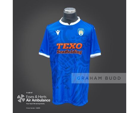 Colchester United 2020-21 season replica shirt personally signed in black marker to the front by 19 members of the playing sq