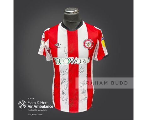 Brentford 2019-20 season replica shirt personally signed in black marker to the front by 22 members of the playing squad. Com