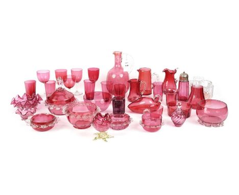 A selection of Victorian and later cranberry glass, including: a jar with clear glass frilled edge, and its cover decorated w