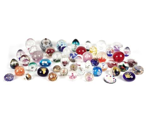 A selection of glass paperweights, of various sizes, makers including Caithness, most unmarked, designs including: Caithness 