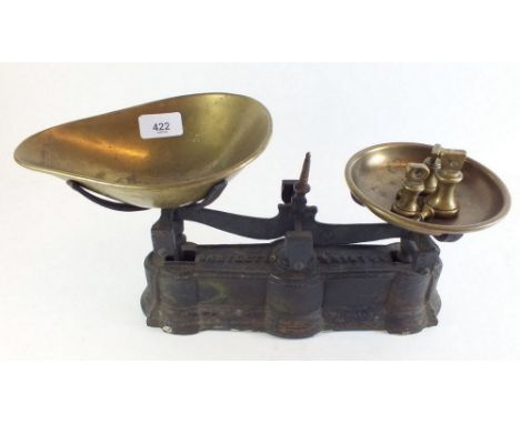 A set of Victorian cast iron and brass scales by Bartlett of Bristol with set of small bell weights, 4 ozs to 1/4 ozs