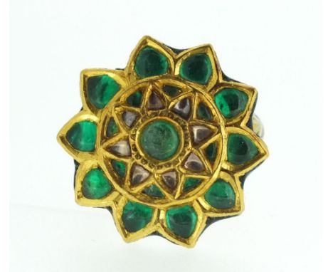 An Indian gold cluster flower form ring set green stones with decorative floral enamel back and band, 2.3 cm diameter - size 